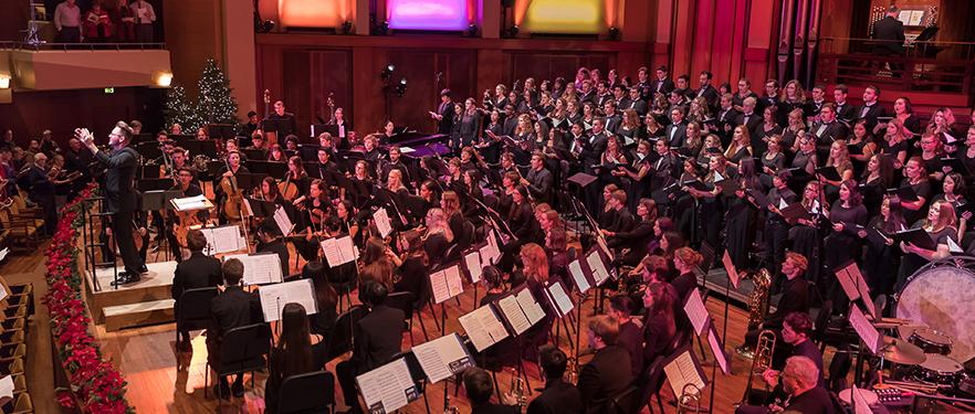 SPU student musicians performing Christmas music at Benaroya Hall.